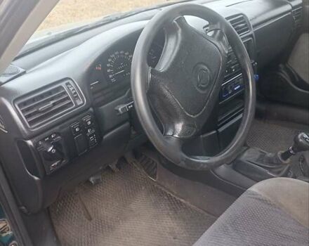 Зеленый Опель Вектра, объемом двигателя 2 л и пробегом 400 тыс. км за 1900 $, фото 7 на Automoto.ua