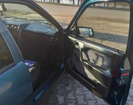 Зелений Опель Вектра, об'ємом двигуна 2 л та пробігом 352 тис. км за 2100 $, фото 16 на Automoto.ua