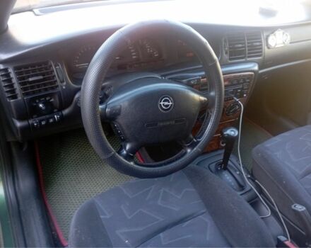 Зеленый Опель Вектра, объемом двигателя 2.5 л и пробегом 223 тыс. км за 2500 $, фото 6 на Automoto.ua