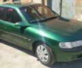 Зеленый Опель Вектра, объемом двигателя 2 л и пробегом 307 тыс. км за 2600 $, фото 1 на Automoto.ua