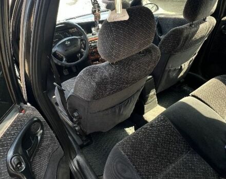 Зелений Опель Вектра, об'ємом двигуна 2 л та пробігом 340 тис. км за 3300 $, фото 6 на Automoto.ua