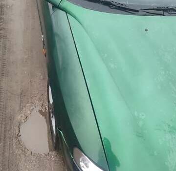 Зеленый Опель Вектра, объемом двигателя 2 л и пробегом 246 тыс. км за 2000 $, фото 9 на Automoto.ua