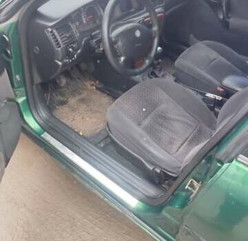 Зеленый Опель Вектра, объемом двигателя 2 л и пробегом 246 тыс. км за 2000 $, фото 22 на Automoto.ua