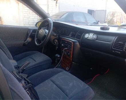 Зеленый Опель Вектра, объемом двигателя 2.5 л и пробегом 223 тыс. км за 2500 $, фото 4 на Automoto.ua