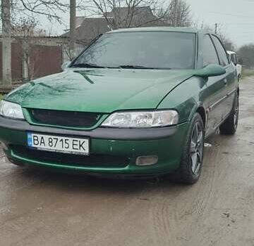 Зеленый Опель Вектра, объемом двигателя 2 л и пробегом 246 тыс. км за 2000 $, фото 1 на Automoto.ua