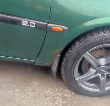 Зеленый Опель Вектра, объемом двигателя 2 л и пробегом 246 тыс. км за 2000 $, фото 28 на Automoto.ua