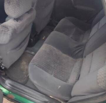 Зеленый Опель Вектра, объемом двигателя 2 л и пробегом 246 тыс. км за 2000 $, фото 19 на Automoto.ua