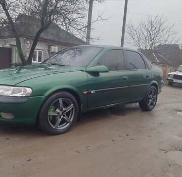 Зеленый Опель Вектра, объемом двигателя 2 л и пробегом 246 тыс. км за 2000 $, фото 2 на Automoto.ua