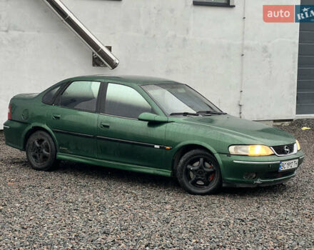 Зелений Опель Вектра, об'ємом двигуна 2 л та пробігом 359 тис. км за 899 $, фото 4 на Automoto.ua