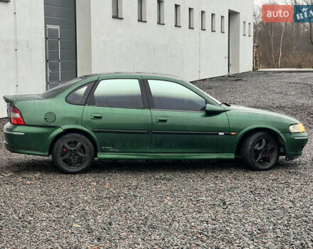 Зелений Опель Вектра, об'ємом двигуна 2 л та пробігом 359 тис. км за 899 $, фото 9 на Automoto.ua