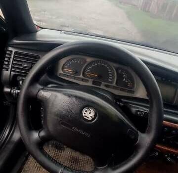 Зеленый Опель Вектра, объемом двигателя 2 л и пробегом 246 тыс. км за 2000 $, фото 43 на Automoto.ua