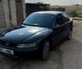 Зеленый Опель Вектра, объемом двигателя 2 л и пробегом 340 тыс. км за 3500 $, фото 1 на Automoto.ua