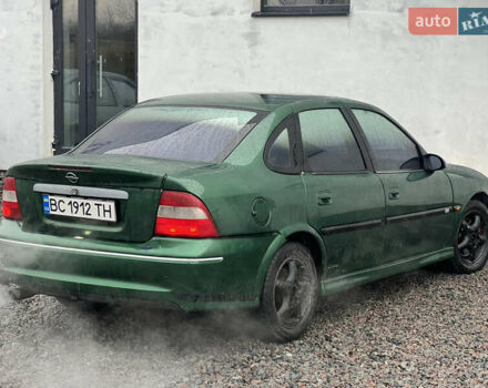 Зелений Опель Вектра, об'ємом двигуна 2 л та пробігом 359 тис. км за 899 $, фото 12 на Automoto.ua