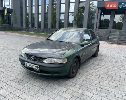 Зеленый Опель Вектра, объемом двигателя 1.8 л и пробегом 350 тыс. км за 999 $, фото 1 на Automoto.ua