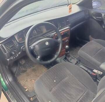 Зеленый Опель Вектра, объемом двигателя 2 л и пробегом 246 тыс. км за 2000 $, фото 45 на Automoto.ua