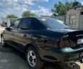Зеленый Опель Вектра, объемом двигателя 2 л и пробегом 340 тыс. км за 3300 $, фото 3 на Automoto.ua