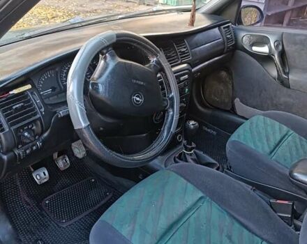 Зелений Опель Вектра, об'ємом двигуна 2 л та пробігом 300 тис. км за 1850 $, фото 6 на Automoto.ua