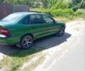 Зеленый Опель Вектра, объемом двигателя 1 л и пробегом 1000 тыс. км за 2400 $, фото 1 на Automoto.ua