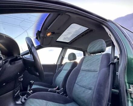 Зеленый Опель Вектра, объемом двигателя 1.8 л и пробегом 344 тыс. км за 1650 $, фото 24 на Automoto.ua