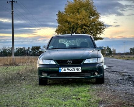 Зеленый Опель Вектра, объемом двигателя 1.8 л и пробегом 344 тыс. км за 1650 $, фото 1 на Automoto.ua