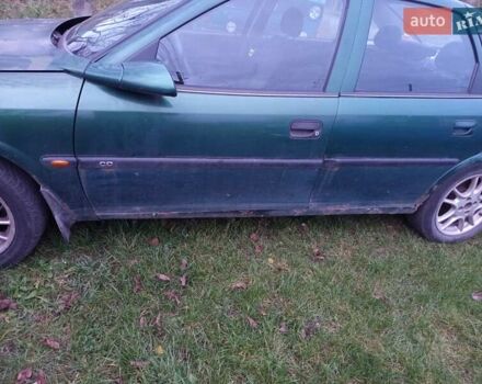 Зеленый Опель Вектра, объемом двигателя 1.8 л и пробегом 319 тыс. км за 1000 $, фото 14 на Automoto.ua