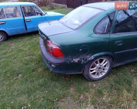 Зеленый Опель Вектра, объемом двигателя 1.8 л и пробегом 319 тыс. км за 1000 $, фото 8 на Automoto.ua
