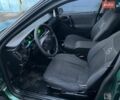 Зеленый Опель Вектра, объемом двигателя 2 л и пробегом 250 тыс. км за 1750 $, фото 5 на Automoto.ua