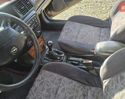 Зеленый Опель Вектра, объемом двигателя 1.8 л и пробегом 251 тыс. км за 2250 $, фото 38 на Automoto.ua