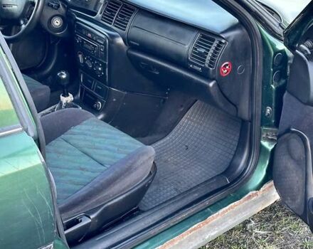 Зеленый Опель Вектра, объемом двигателя 1.8 л и пробегом 344 тыс. км за 1650 $, фото 20 на Automoto.ua