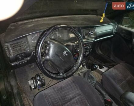 Зеленый Опель Вектра, объемом двигателя 1.8 л и пробегом 319 тыс. км за 1000 $, фото 23 на Automoto.ua