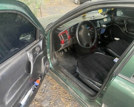 Зеленый Опель Вектра, объемом двигателя 2 л и пробегом 1000 тыс. км за 1668 $, фото 6 на Automoto.ua