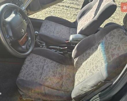 Зеленый Опель Вектра, объемом двигателя 1.8 л и пробегом 251 тыс. км за 2250 $, фото 35 на Automoto.ua