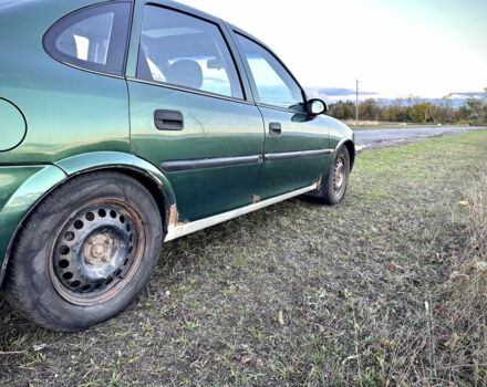 Зеленый Опель Вектра, объемом двигателя 1.8 л и пробегом 344 тыс. км за 1650 $, фото 11 на Automoto.ua