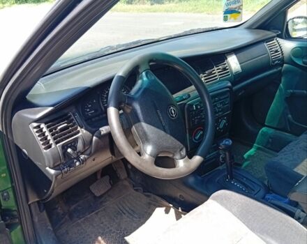 Зеленый Опель Вектра, объемом двигателя 1 л и пробегом 1000 тыс. км за 2200 $, фото 3 на Automoto.ua