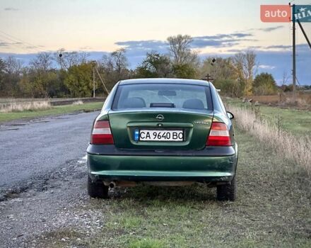 Зеленый Опель Вектра, объемом двигателя 1.8 л и пробегом 344 тыс. км за 1650 $, фото 4 на Automoto.ua