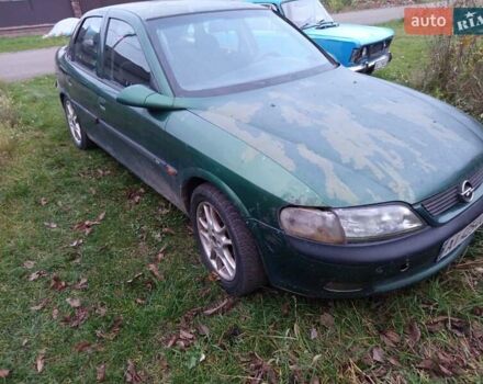 Зеленый Опель Вектра, объемом двигателя 1.8 л и пробегом 319 тыс. км за 1000 $, фото 4 на Automoto.ua