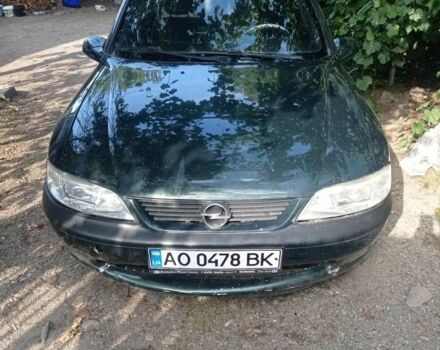 Зелений Опель Вектра, об'ємом двигуна 1.8 л та пробігом 319 тис. км за 1500 $, фото 6 на Automoto.ua