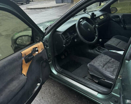 Зелений Опель Вектра, об'ємом двигуна 1.8 л та пробігом 356 тис. км за 2600 $, фото 10 на Automoto.ua