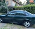 Зелений Опель Вектра, об'ємом двигуна 2 л та пробігом 256 тис. км за 2300 $, фото 1 на Automoto.ua