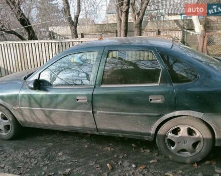 Зеленый Опель Вектра, объемом двигателя 2 л и пробегом 350 тыс. км за 1900 $, фото 1 на Automoto.ua