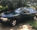 Зеленый Опель Вектра, объемом двигателя 1.8 л и пробегом 250 тыс. км за 2300 $, фото 1 на Automoto.ua