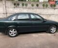 Зелений Опель Вектра, об'ємом двигуна 1.8 л та пробігом 450 тис. км за 1100 $, фото 1 на Automoto.ua