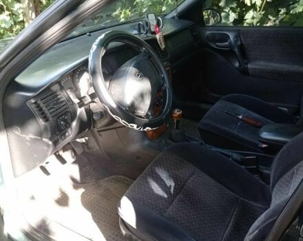 Зелений Опель Вектра, об'ємом двигуна 1.8 л та пробігом 319 тис. км за 1500 $, фото 4 на Automoto.ua