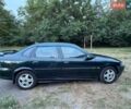 Зелений Опель Вектра, об'ємом двигуна 2 л та пробігом 256 тис. км за 2300 $, фото 1 на Automoto.ua