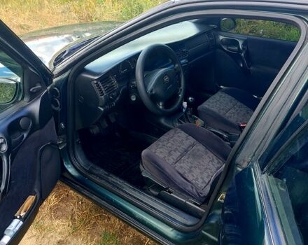 Зеленый Опель Вектра, объемом двигателя 1.8 л и пробегом 187 тыс. км за 2300 $, фото 5 на Automoto.ua