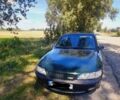 Зелений Опель Вектра, об'ємом двигуна 1.8 л та пробігом 242 тис. км за 2900 $, фото 1 на Automoto.ua