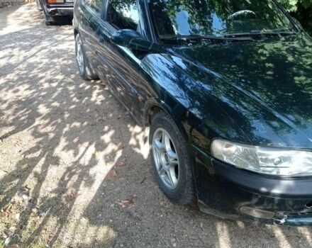 Зелений Опель Вектра, об'ємом двигуна 1.8 л та пробігом 319 тис. км за 1500 $, фото 13 на Automoto.ua