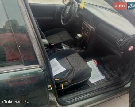Зеленый Опель Вектра, объемом двигателя 2 л и пробегом 320 тыс. км за 1750 $, фото 1 на Automoto.ua