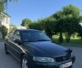 Зеленый Опель Вектра, объемом двигателя 1.8 л и пробегом 290 тыс. км за 1550 $, фото 1 на Automoto.ua