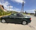 Зеленый Опель Вектра, объемом двигателя 1.8 л и пробегом 446 тыс. км за 2000 $, фото 1 на Automoto.ua